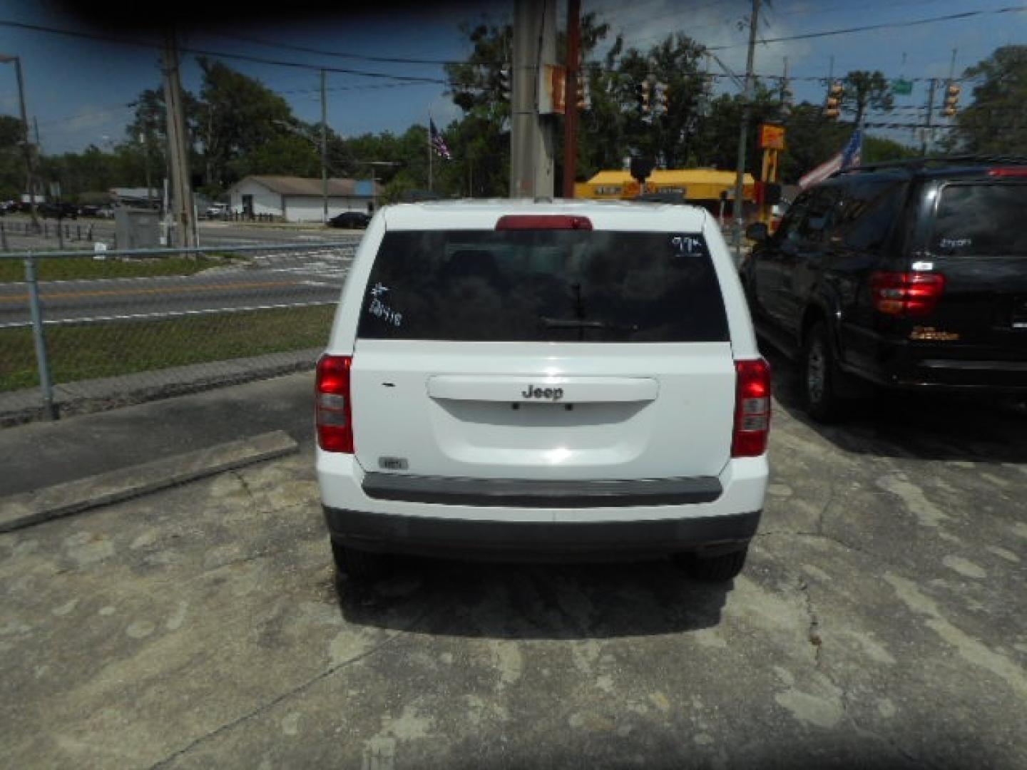 2013 WHITE JEEP PATRIOT SPORT (1C4NJPBA5DD) , located at 1200 Cassat Avenue, Jacksonville, FL, 32205, (904) 695-1885, 30.302404, -81.731033 - Photo#3